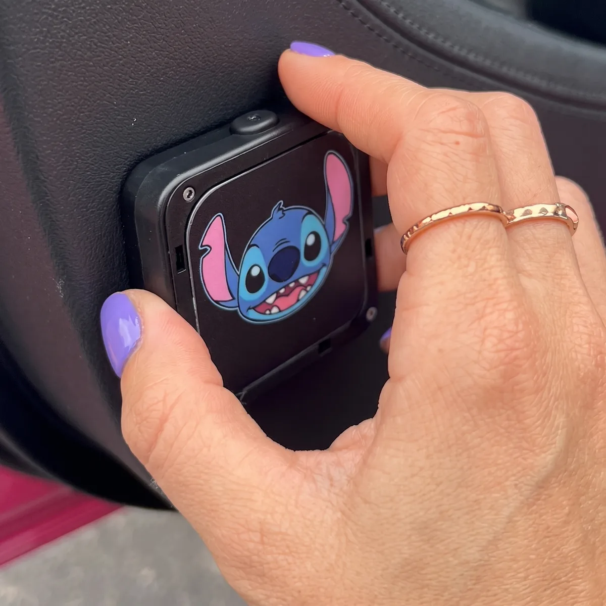 Blue Spike Projector being placed on the car door